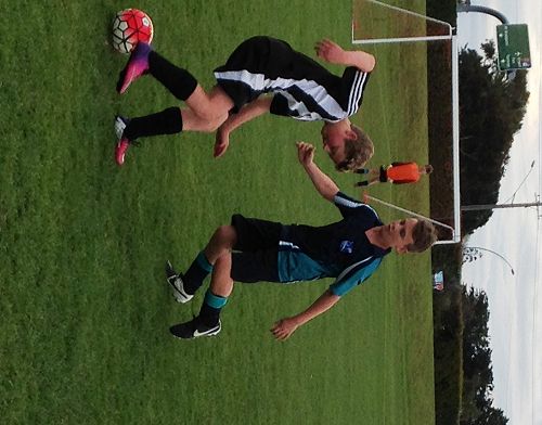 Jacob Maloni fights for possession against Kerikeri Int