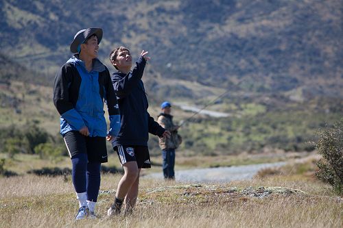 Ben Hall and En Watanabe find inspiration in the sky while Jin Kim fishes for dinner in the background.