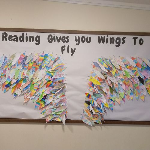 "Reading gives you wings to Fly" - Feathers made by Kaurilands Students