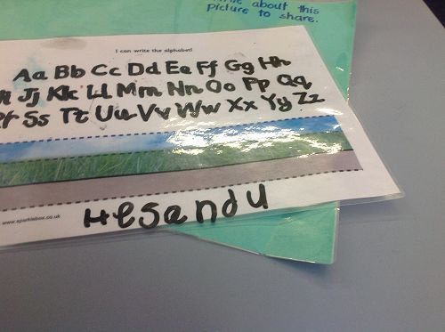 Hesandu carefully practises his letter formation to improve his handwriting.  Love your work:-)