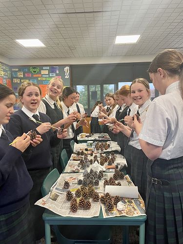 Year 8's painting pinecones