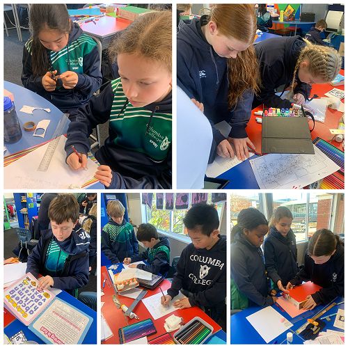 Year 6 children designing their products and brainstorming language to suit their target market