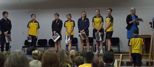 A group of Miss Ryan's Year 8 students being awarded Leaving Certificates