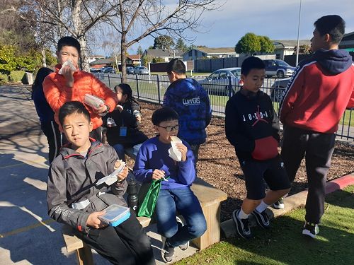 Enjoying a good ol kiwi sausage sizzle