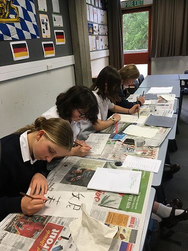 Year 10 Chinese students learning calligraphy