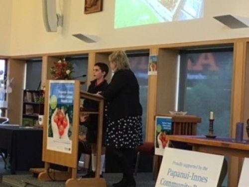Samuel explaining features of the school garden to Christchurch City Councillor, Ali Jones.