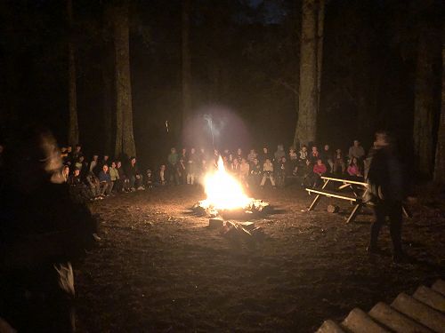 The classic camp experience in NZ - singing round the camp fire