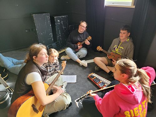 Roncalli students developing their song ideas