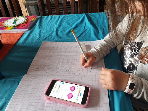 India Allison (Year 4) practicing her addition and subtraction with regrouping