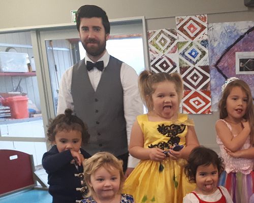 Matua Jordan and the two blondies nearest him are his daughters, Emily and Erena.