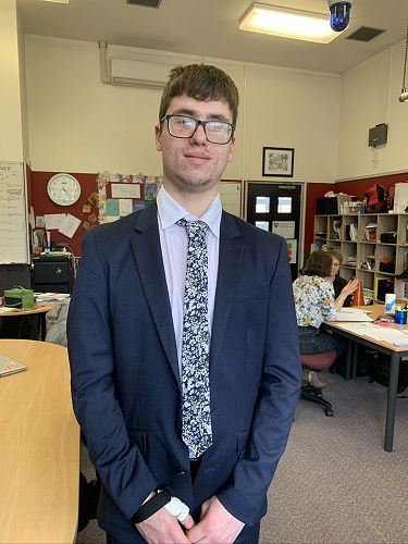 Thomas preparing himself for a mock job interview