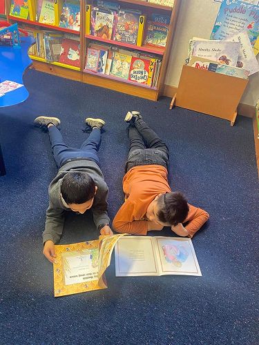 Luka and Caden sharing the love of reading