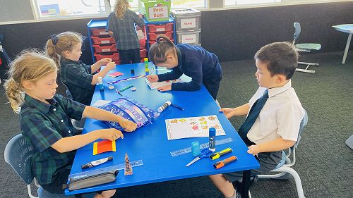 Students working on different activities about the Chinese New Year celebrations