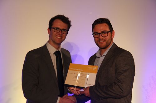 Danyon Thomas presents Sam Blackmore with his Gold Award for Community Engagement
