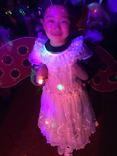 Ellie as a butterfly at the disco.