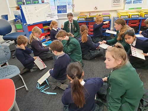 Beginning their sewing experience