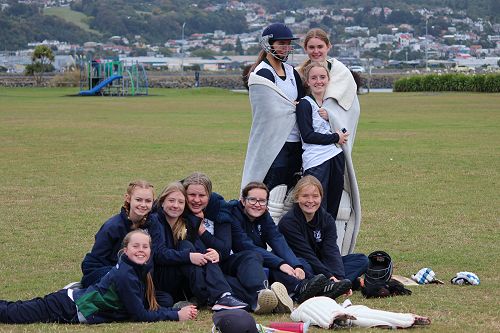 Team members trying to keep warm