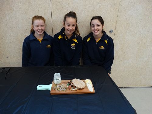 Neve, Briana, and Mia with their gyros with home made mint yoghurt sauce.