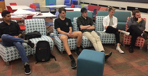 AJ, Curtis, Griffin, Finn and Kirio listening to a