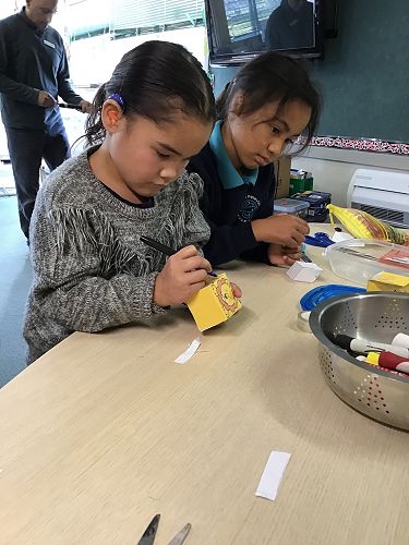 Language Day in Moerewa - Annemarie drawing on her 3d shape