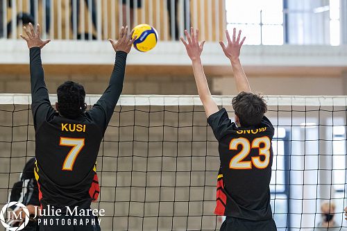 Kawana Snow up for the block with teammate