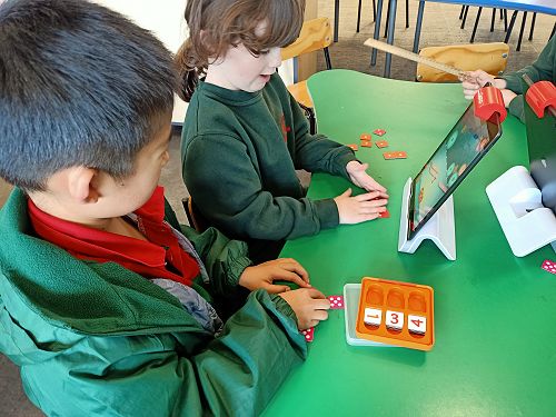 Deanna and Jason working on Ozmo!