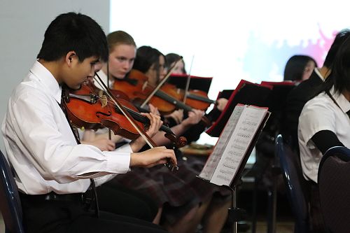 Orchestra Performs at Assembly!