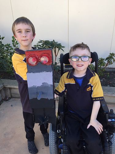 Jacob and Chase and their robot Jack.