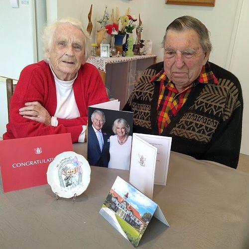 Methodist Church stalwarts Daphne and George Forster
receive a greeting from King Charles and Queen Camilla.