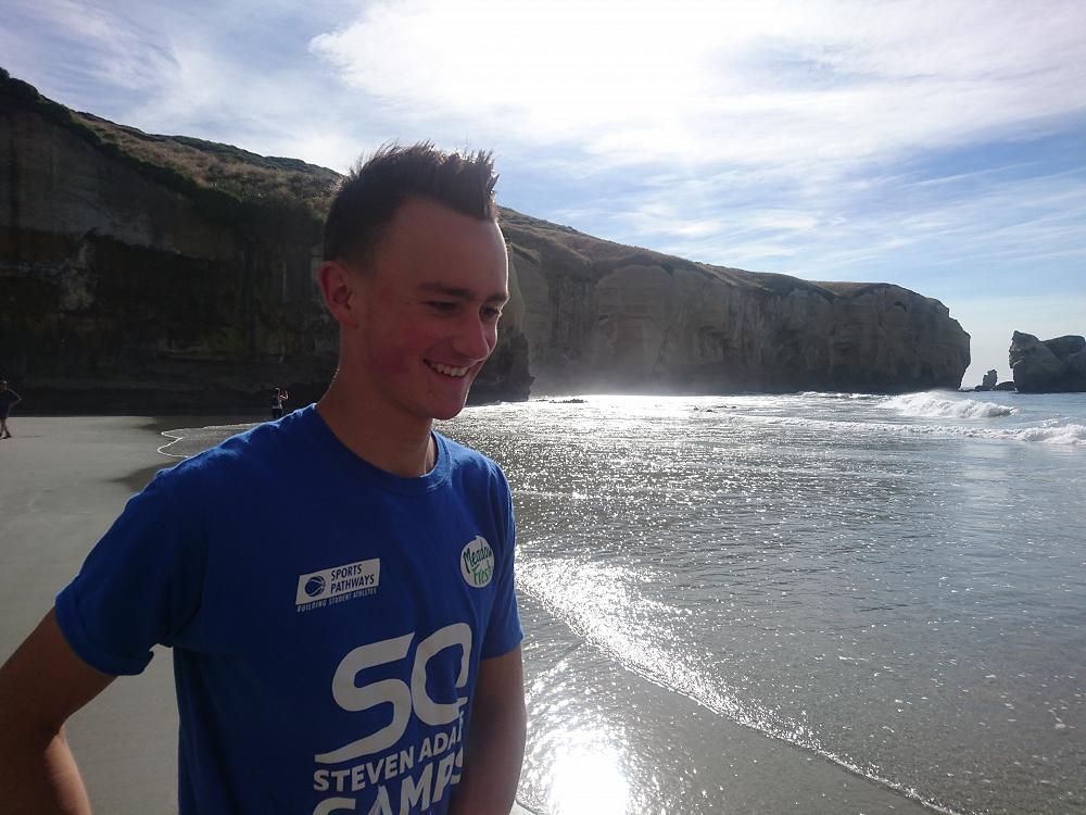 Harrison Jolly clearly amused by something a Tunnel Beach