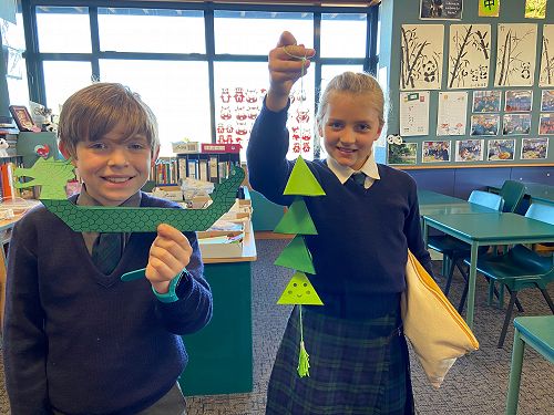 Year 6 Charles French and Ruby McIlroy making drag boar and dumpling