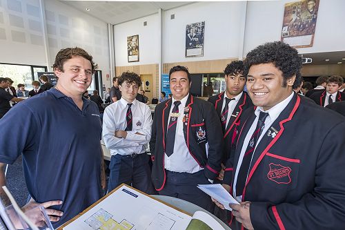 Old boy Alex Caddick, from Design Builders, with (from left), Dom Morgan, Wiremu Day Jones, Vili Fifita, and Soane Tahi.