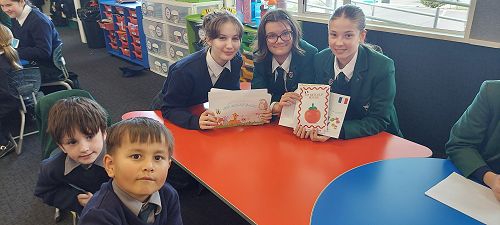 Year 9 class sharing their stories with Year 1-2 Students