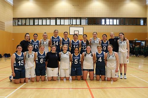 Columba and STAC Basketball teams