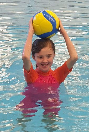What a beautiful smile. It is fantastic to see our kids so confident in the water!
