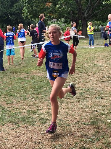 Lydia running to the finish line