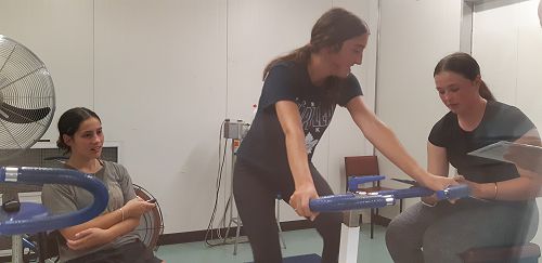 Zara on the bike in the heat chamber