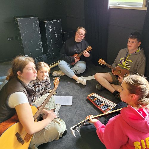 Roncalli students developing their song ideas