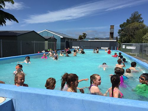 Enjoying the refreshing school pool