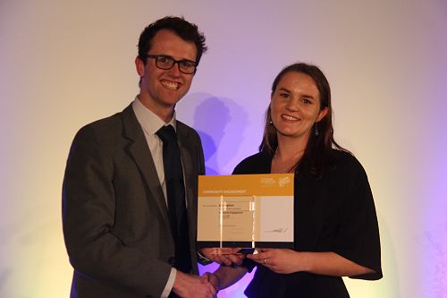 Danyon Thomas presents Alice Ingham with her Gold Community Engagement award