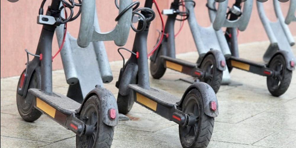 Scooters Parked at the Scooter Rack and Locked