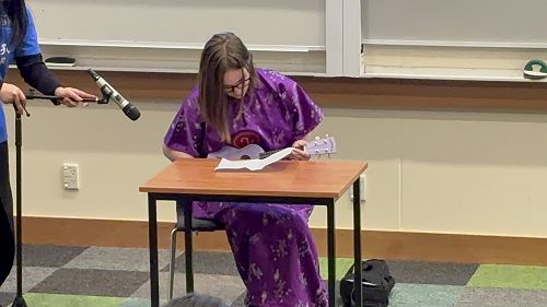 Darcy playing ukulele