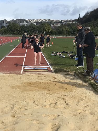 Iris flying into the Long Jump Pit.