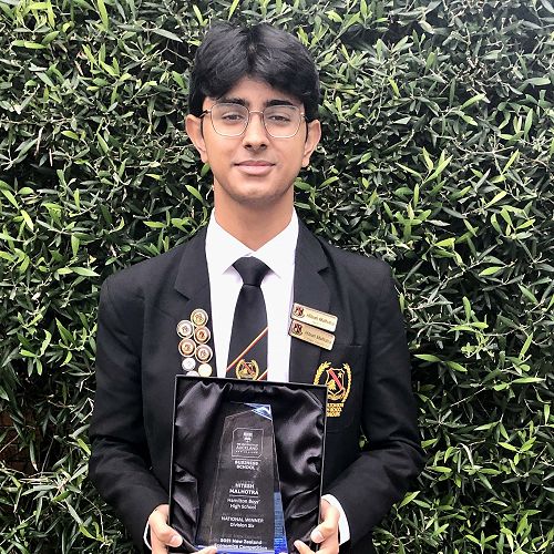 Hitesh Malhotra with his New Zealand Economics Competition trophy