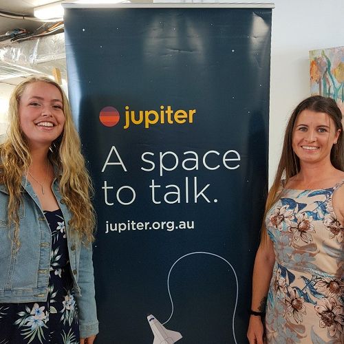 E-Club Serving Humanity D9705, Ashleigh Price, jupiter’s first ambassador, speaking with her friend Lisa about their respective mental health journeys.