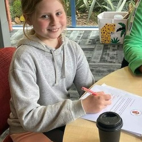 Our Principal for the Day last Thursday, Charlotte, signing some documents with Mrs Augustine.