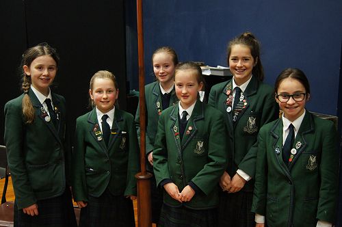 Mary Mengel, Bella Potter, Grace Mitchell, Natalie McDonald, Zara Pratley and Grace Hill help with the Junior School Chapel.