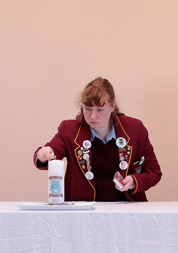 Emily O'Neill lighting the Roncalli Candle