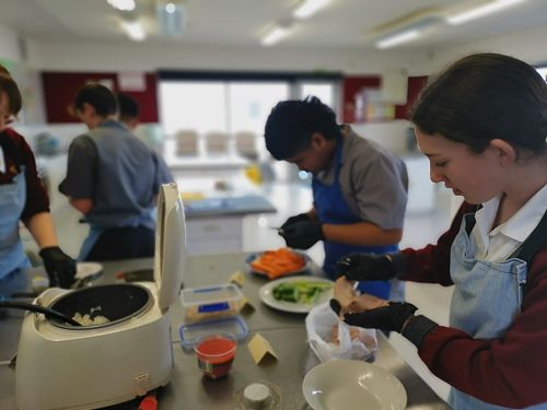 Heidi and the rest of our Year 10 Japanese scholars constructing delicious Bento boxes.