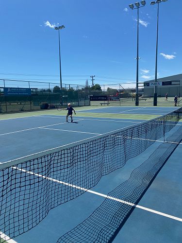 Grace returning a serve